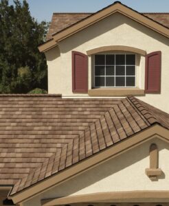a desert-tone shingle roof on family home